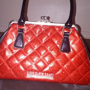 Lux de Ville Bon Voyage Kiss Lock handbag in red sparkle